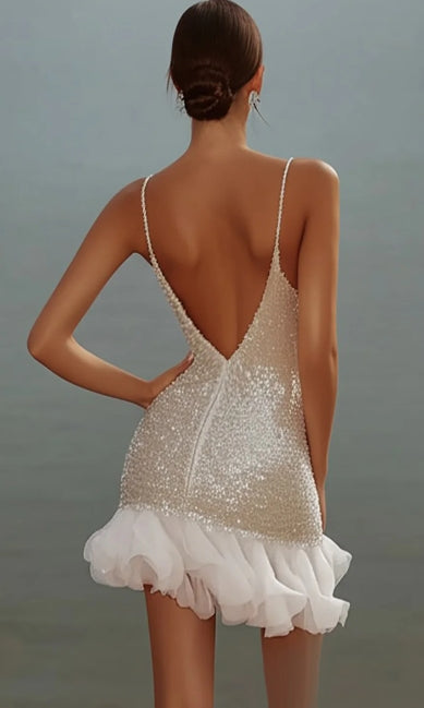 Back view of a shimmering A-line homecoming dress.