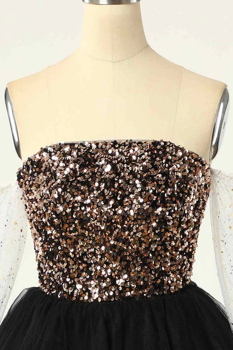 Close-up of the sequin details on the long sleeve homecoming dress.