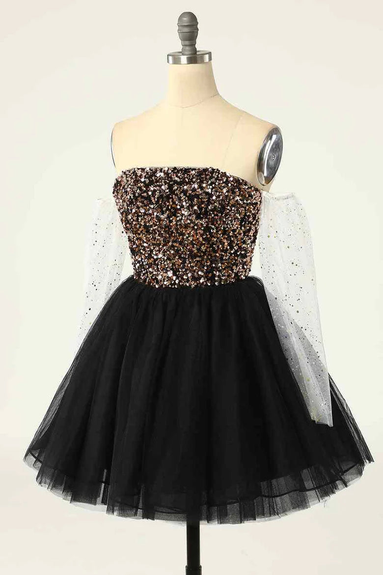 Model posing in the dazzling long sleeve sequin homecoming dress.
