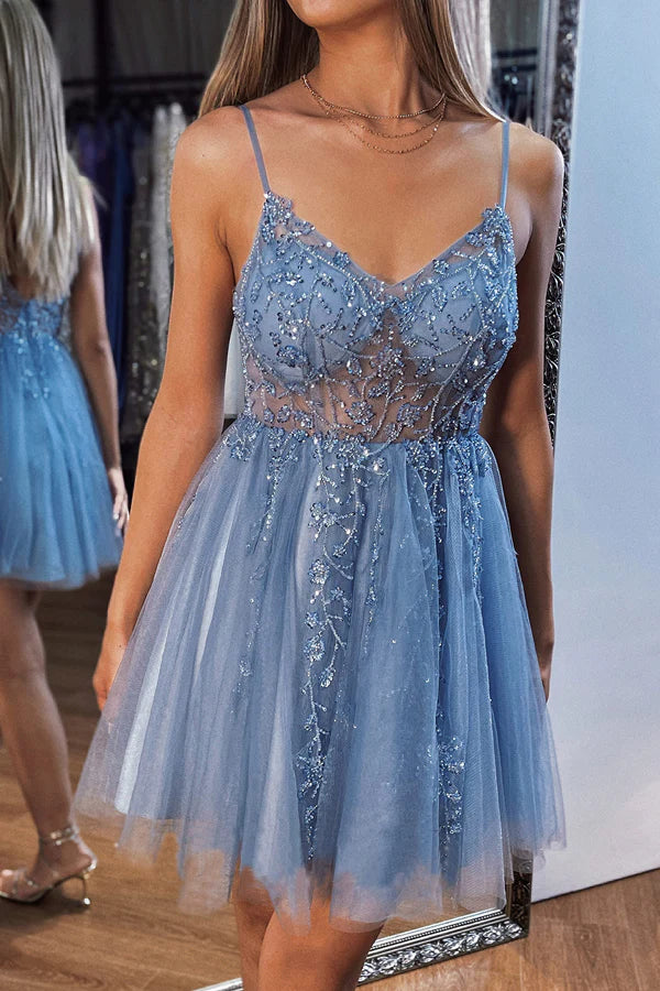 A-line V-neck mini tulle homecoming dress with delicate beading.