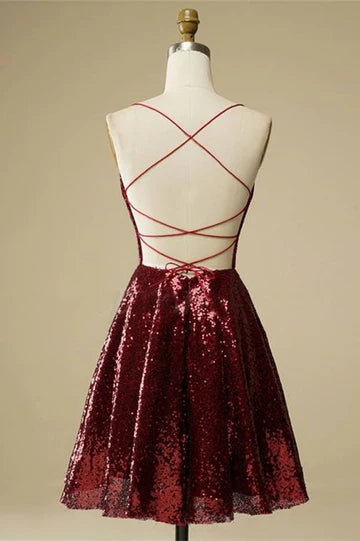 Back view of the A-line sequin mini homecoming dress showing the elegant lace-up detail.