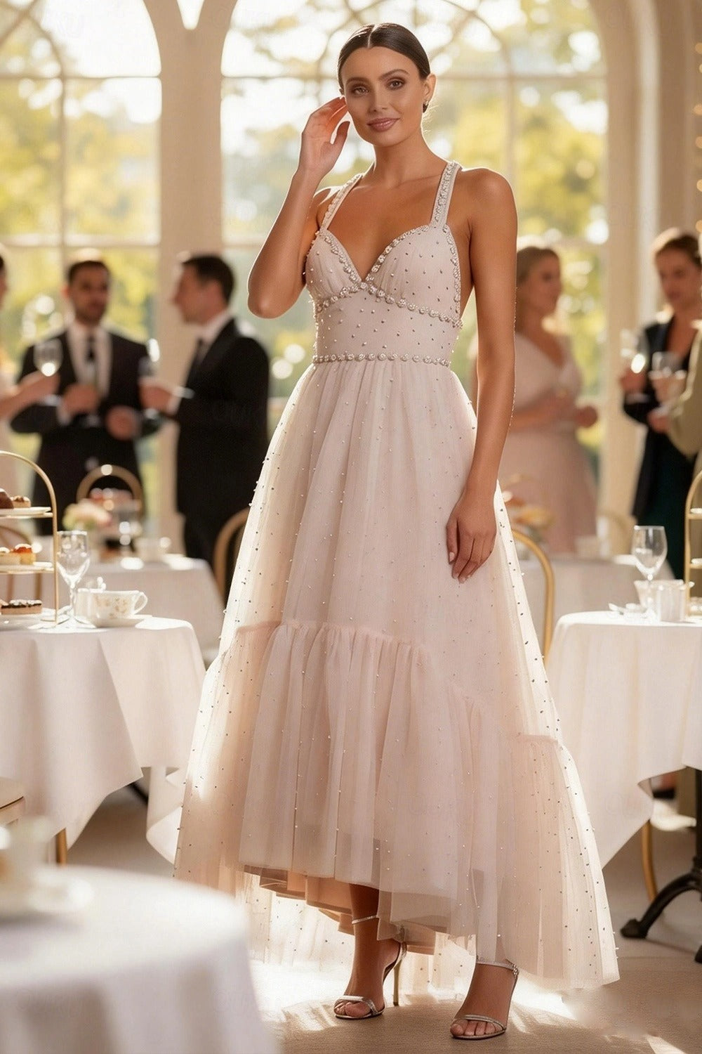 Elegant beaded halter neck tiered tulle gown with crisscross back.