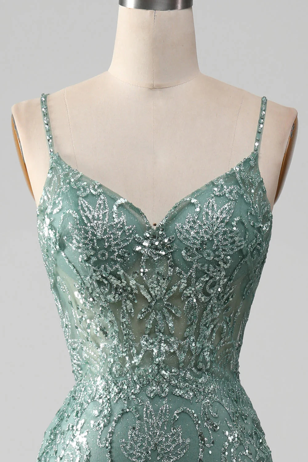Close-up of the intricate beading on a sparkly prom dress.