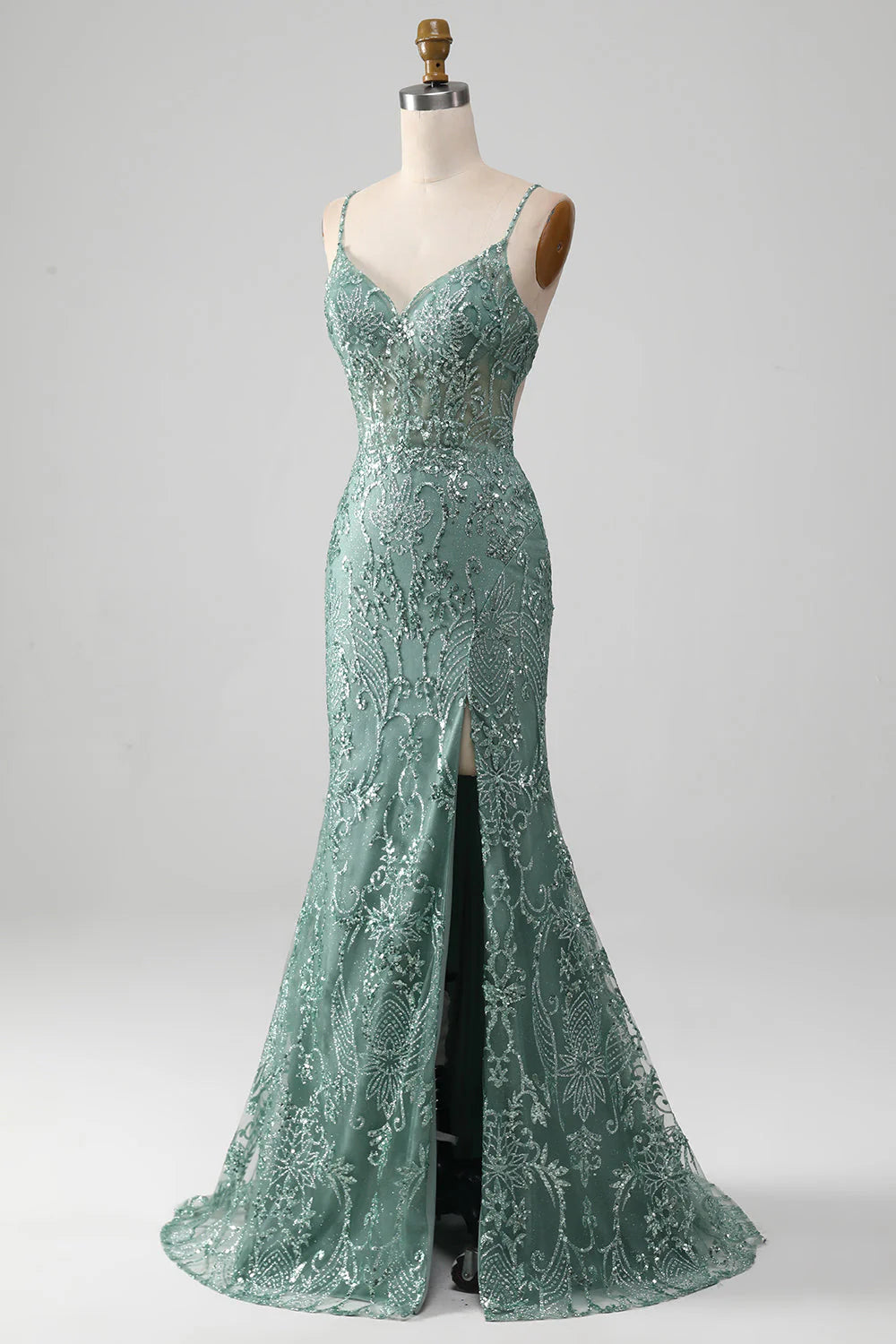 Back view of a sleeveless sparkling beaded evening gown.