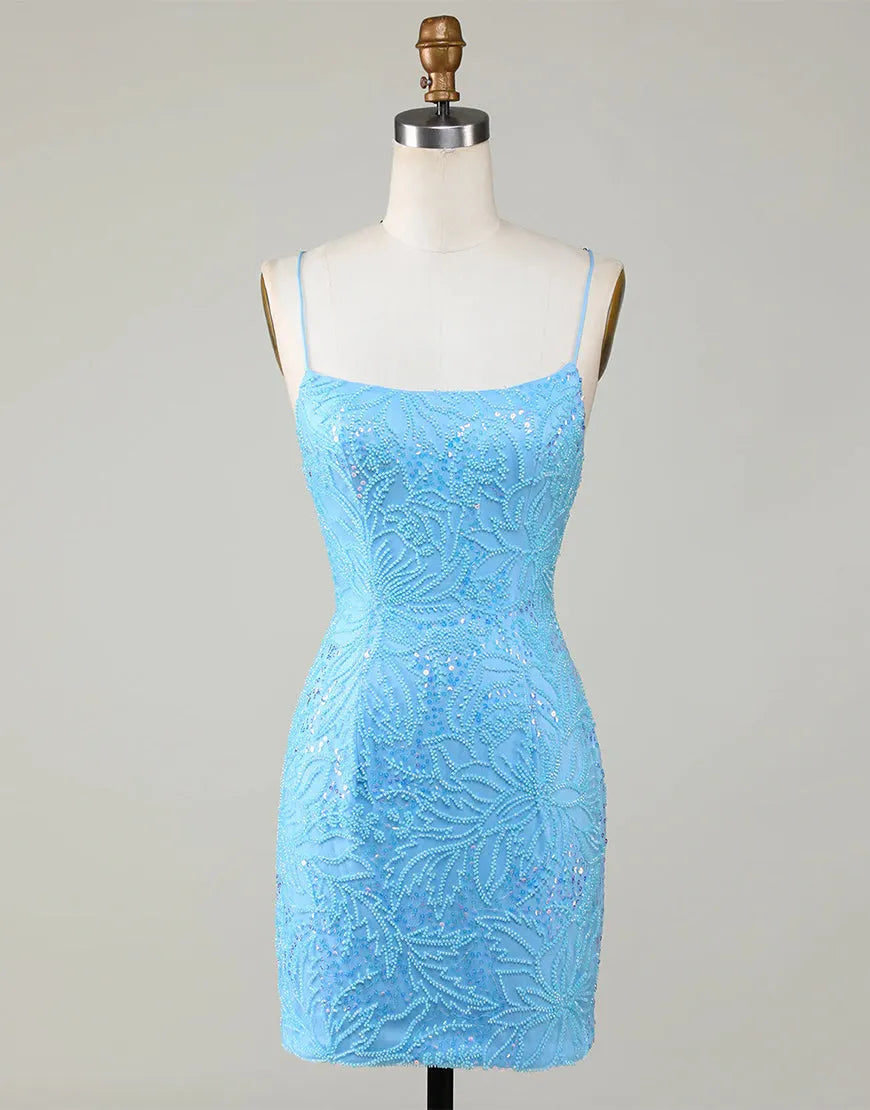 Model wearing a sparkling blue beaded short homecoming dress, front view.