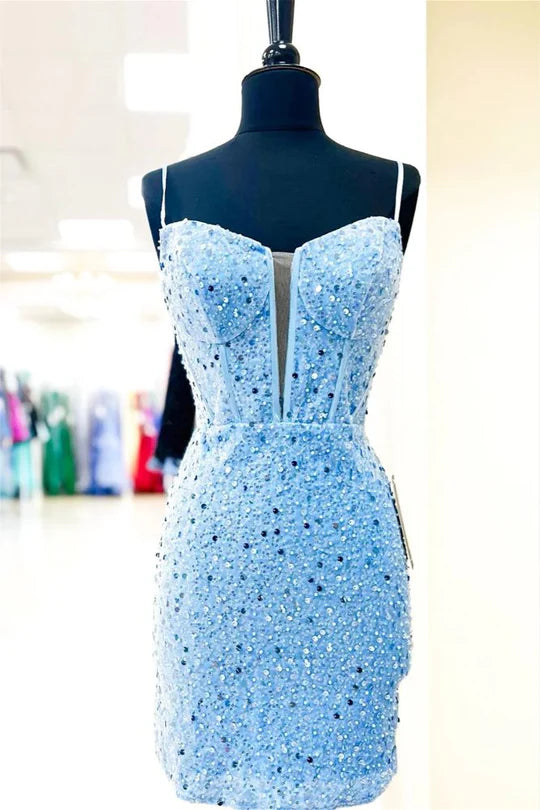 Blue sequin bodycon homecoming dress with V-neck and spaghetti straps.