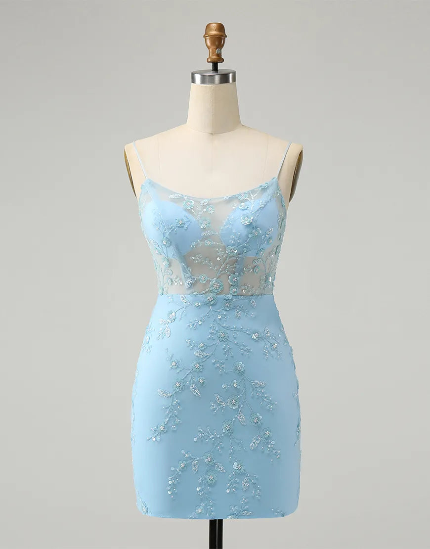 Front view of a sparkling blue sheath homecoming dress with spaghetti straps and beaded flowers.