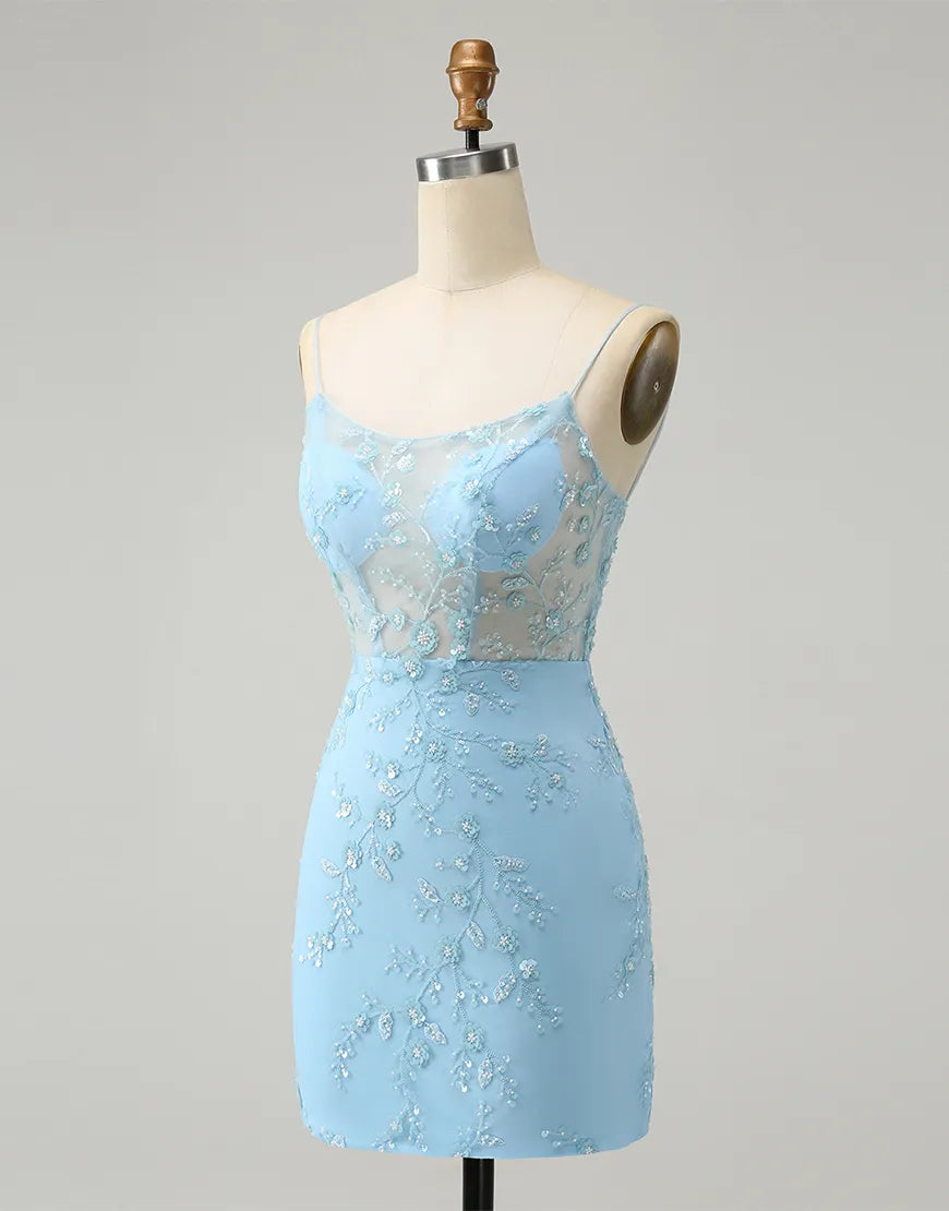 Detailed view of the sparkling fabric and tight fit of the blue sheath dress.