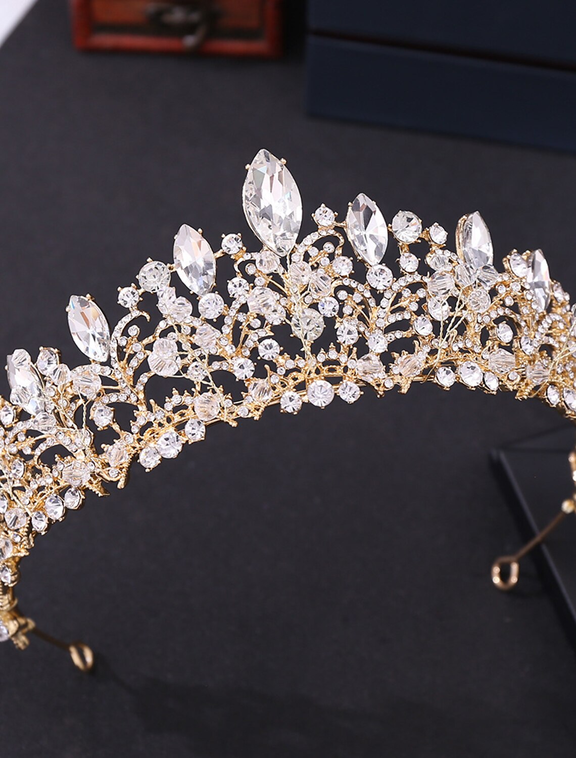 Sparkling alloy bridal tiara headpiece with elegant metal trim.