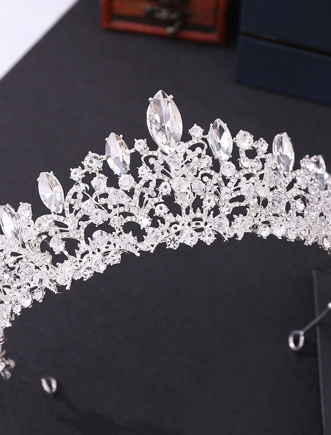 Sparkling alloy bridal tiara headpiece with elegant metal trim.