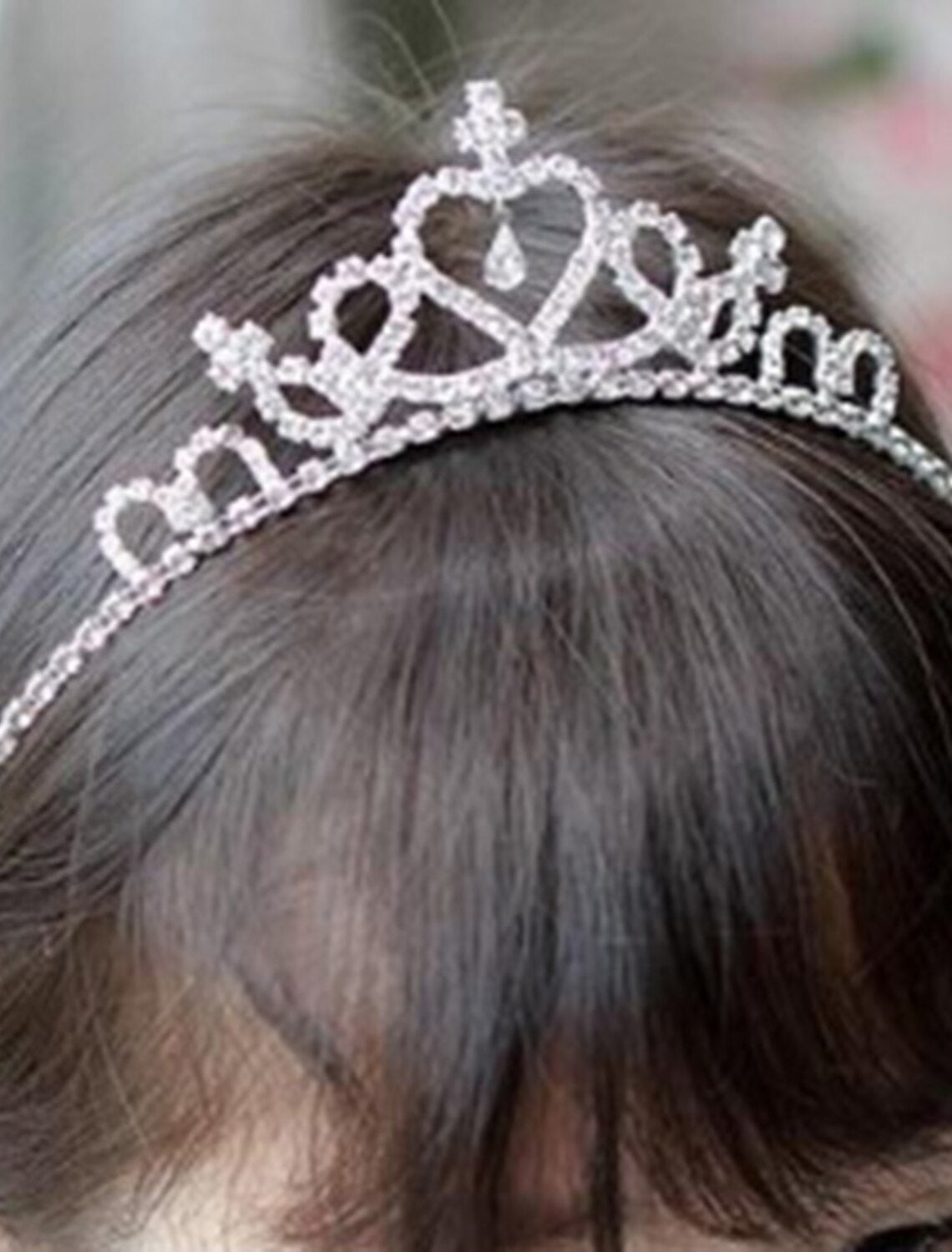 Sparkling silver-tone Elsa princess crown tiara with blue crystals.