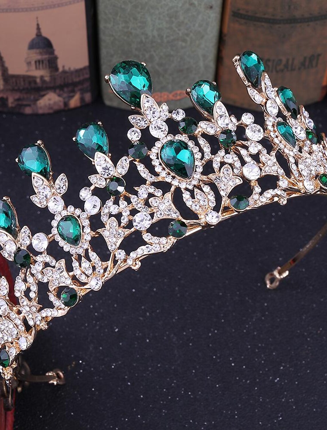 Woman wearing a sparkling crystal rhinestone queen tiara crown.