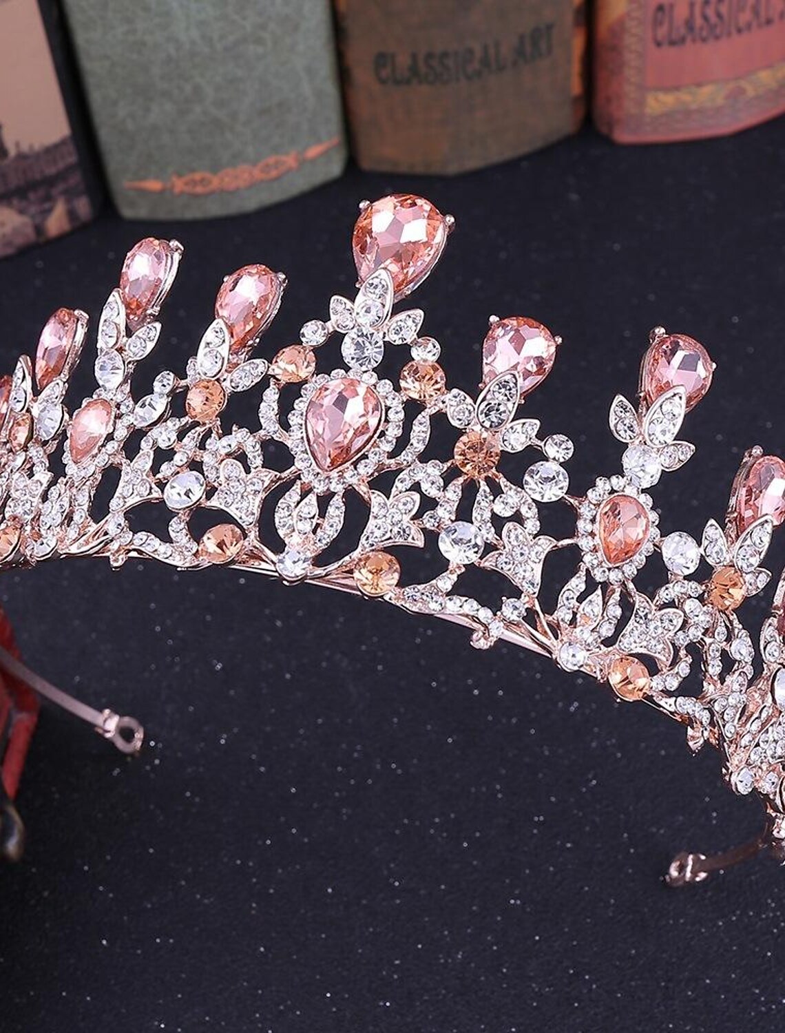 Woman wearing a crystal tiara, viewed from the back.