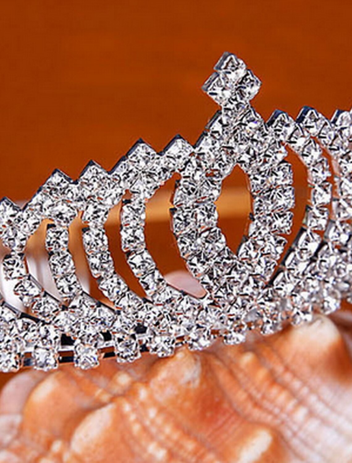 Close-up of crystal tiara showing detailed craftsmanship.