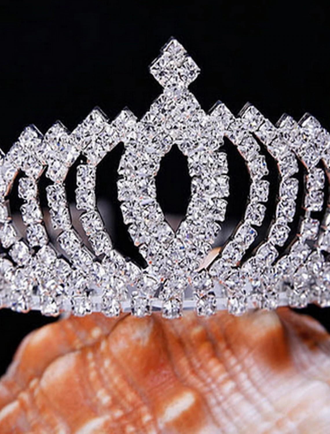 Elegant crystal tiara on a white background.