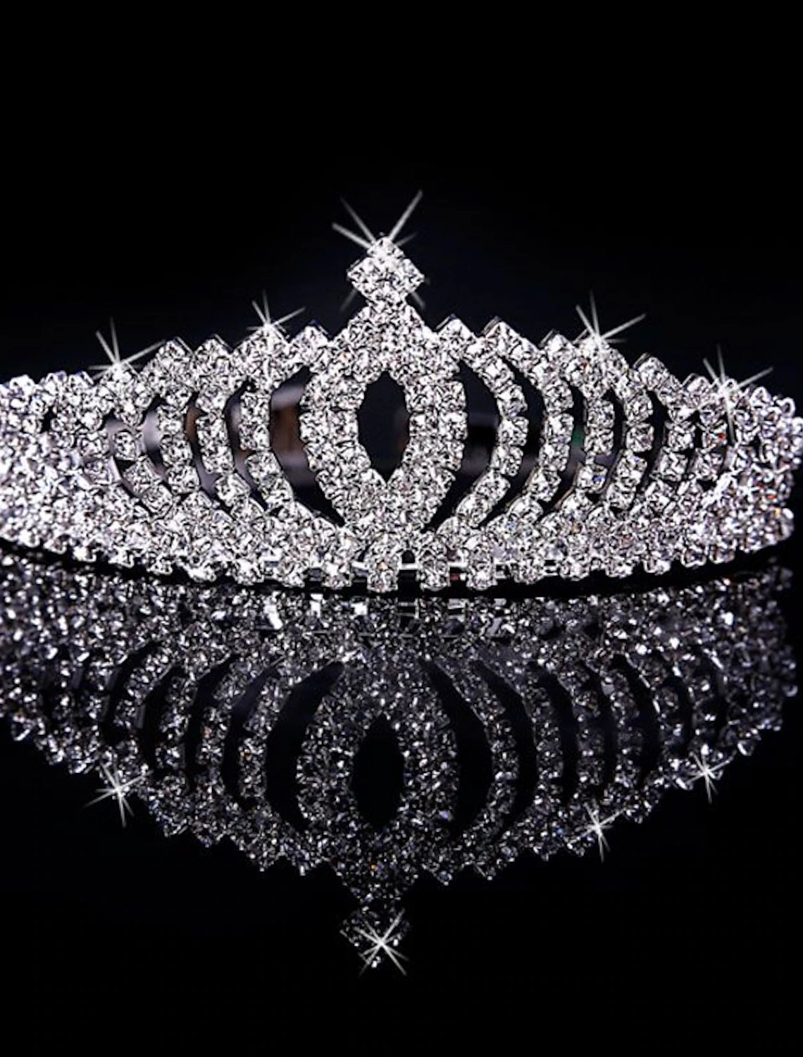 Side view of a shimmering crystal tiara.