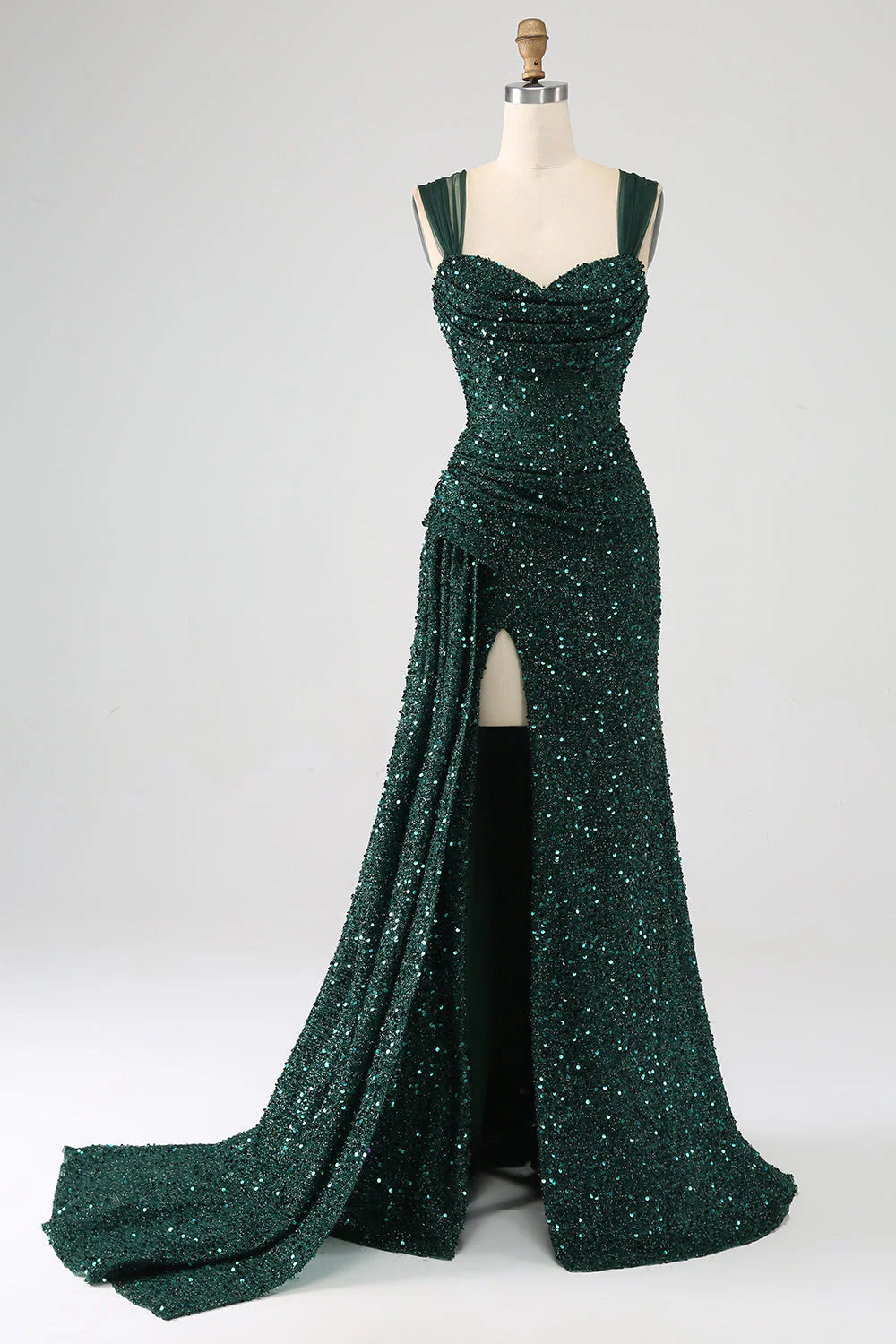 Front view of a sparkling dark green sequin sheath prom dress with a thigh split.