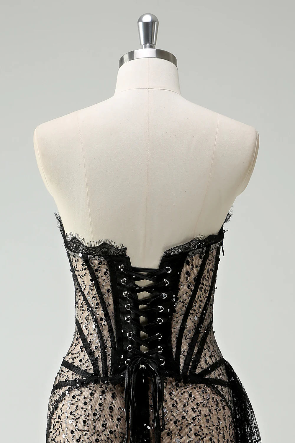 Model wearing the sparkling glitter lace corset short homecoming dress.