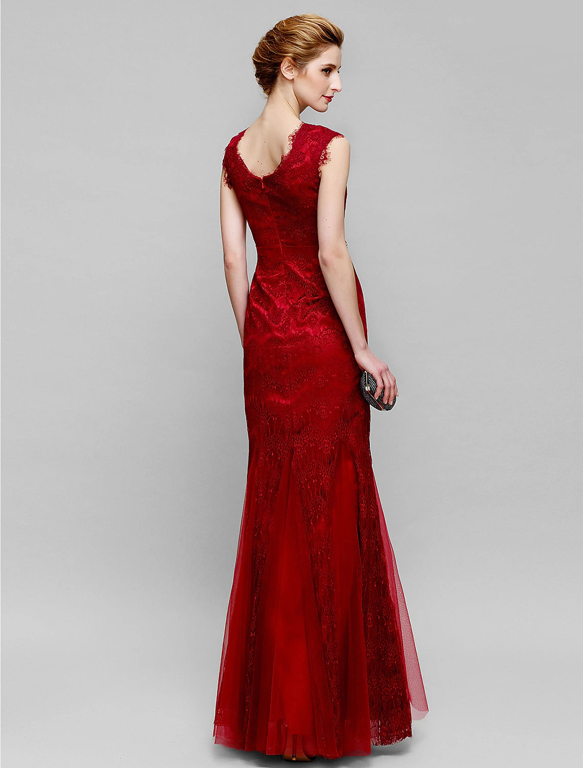 Side view of the lace and tulle Mother of the Bride gown.