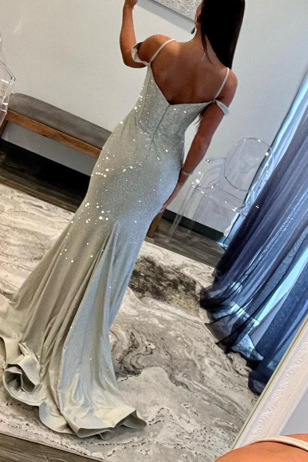 Full view of the long mermaid off-shoulder prom dress, showcasing the glitter fabric and elegant slit.
