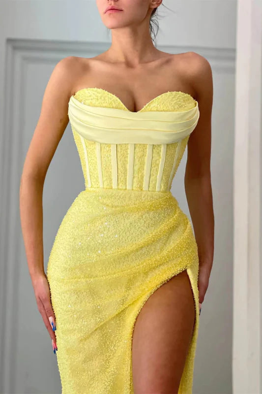 Woman in a shimmering mermaid sequin dress, showcasing the elegant silhouette.
