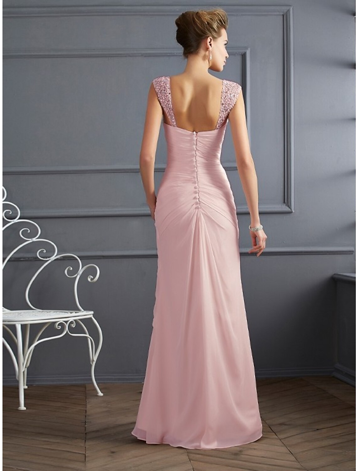 Close-up of the sparkling fabric and rhinestone details on the mermaid gown.