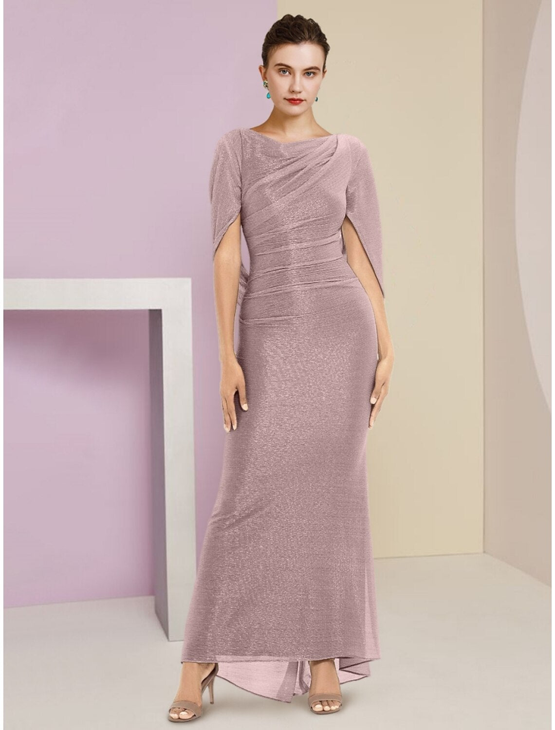 Elegant sparkling Mermaid Trumpet gown with half sleeves.