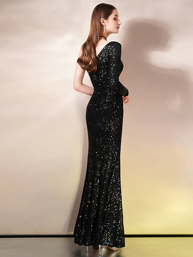 Side view of the elegant one-shoulder sequin gown.