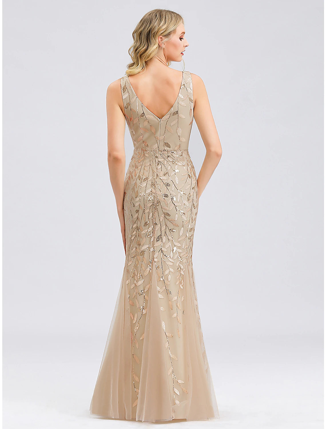 Full view of a shimmering mermaid trumpet formal dress.