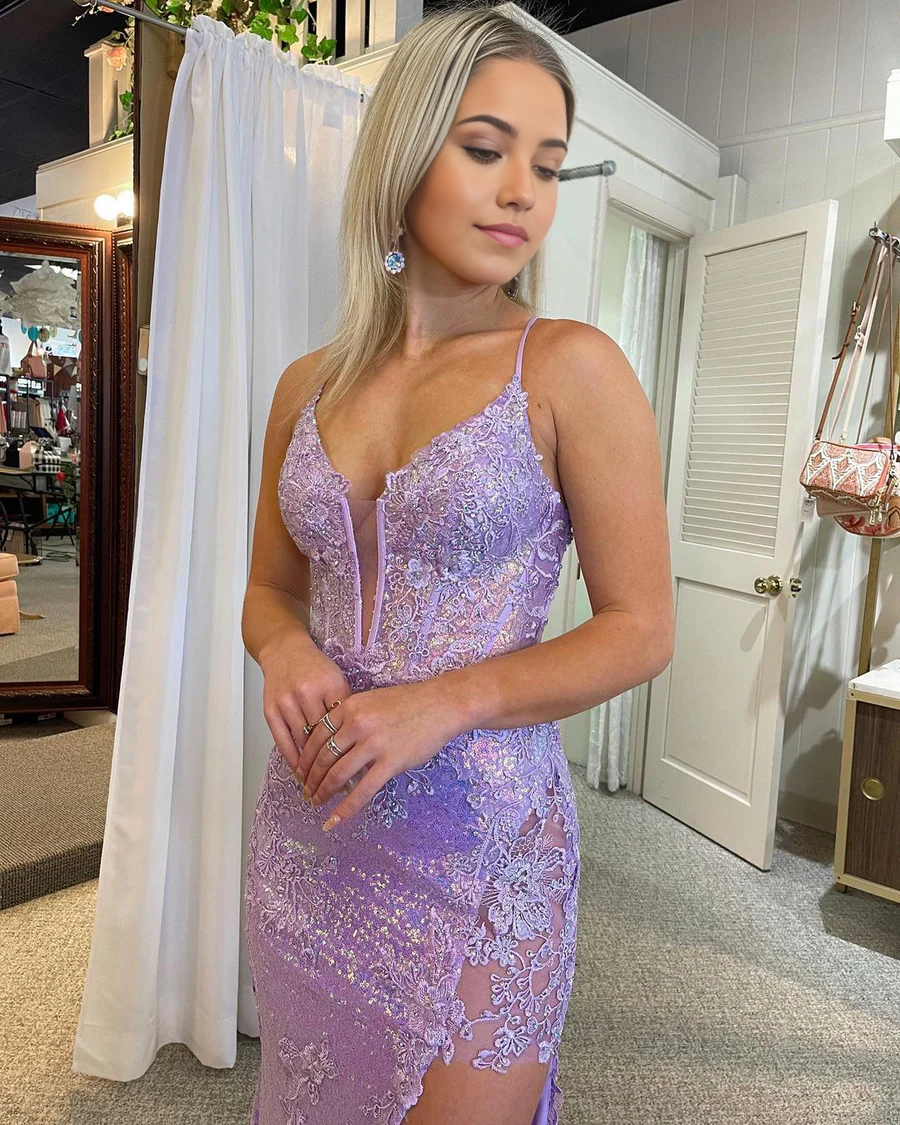 Side view of the mermaid V-neck sequin dress, highlighting the slit detail.