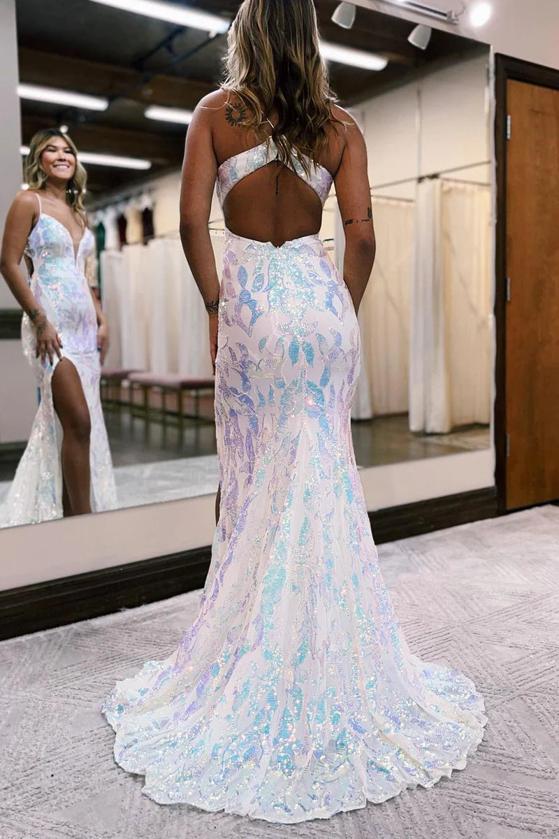 Side profile of a woman in the elegant purple sequin mermaid gown.