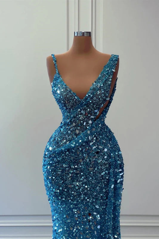 Back view of an elegant mermaid sequin formal gown.