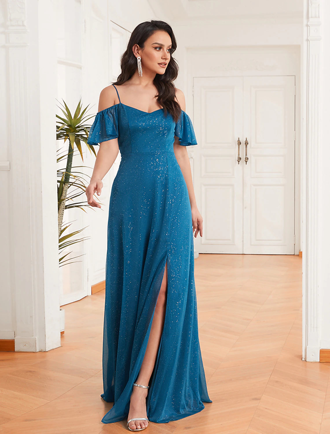 Side view of the flowing sparkling chiffon bridesmaid dress.