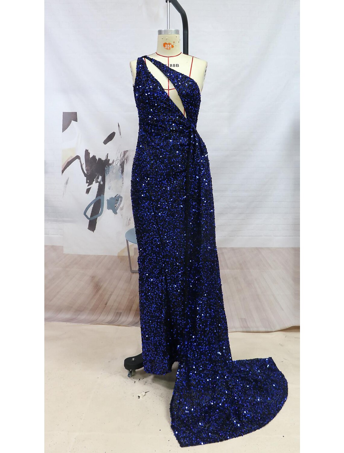 Sparkling one-shoulder mermaid sequin dress with a high slit and court train.