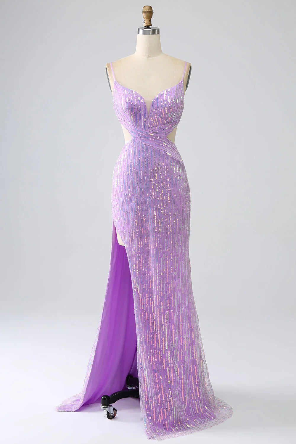 Front view of a sparkling purple mermaid sequin prom dress with spaghetti straps and a high slit.