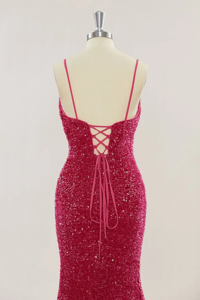 Back view of a red sequin mermaid dress showcasing the elegant train.