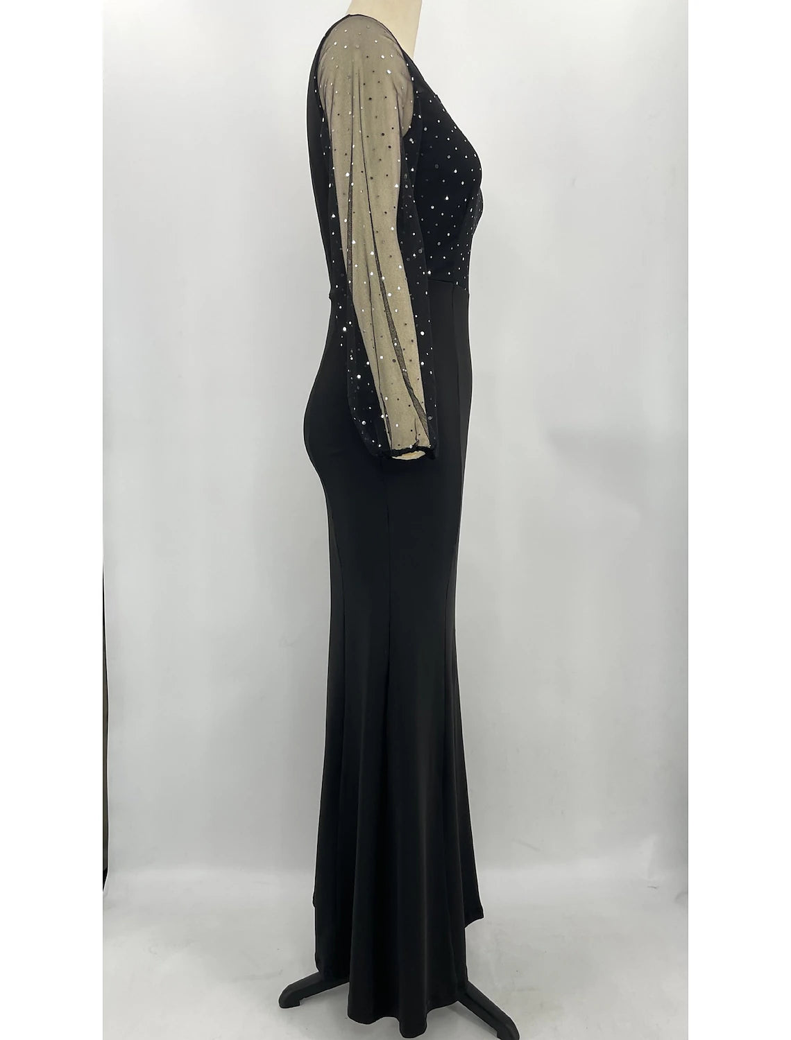 Close-up of rhinestone crystals and jewel neck on formal dress.