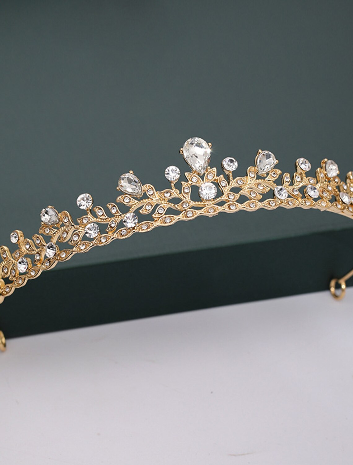 Elegant bridal crown featuring a delicate alloy frame and shimmering rhinestones.