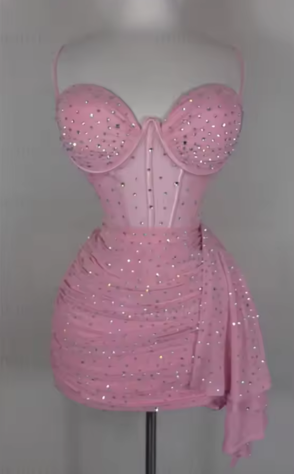 Full view of a woman in a sequin prom and graduation dress.