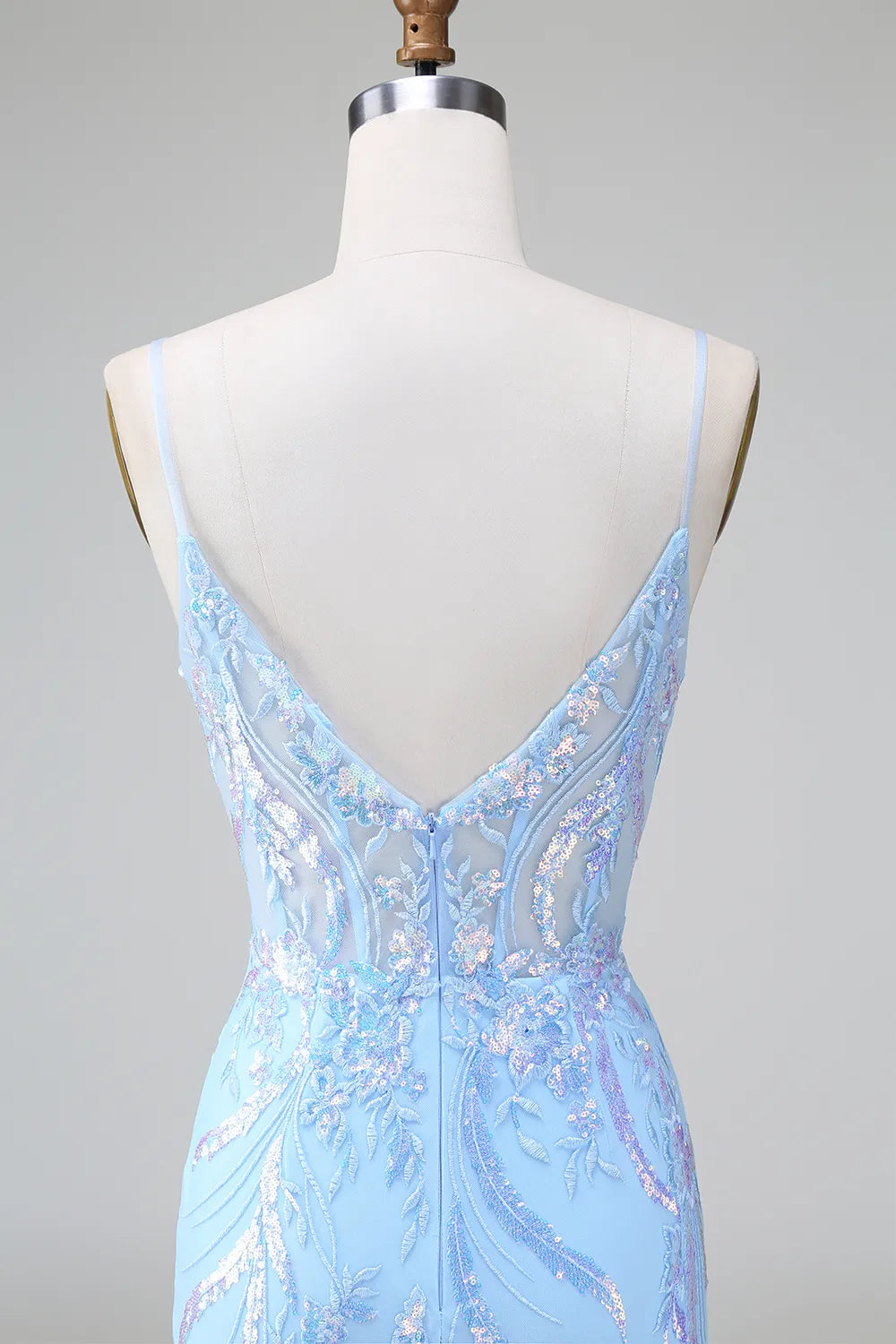 Model wearing blue sequin bodycon dress, full length.