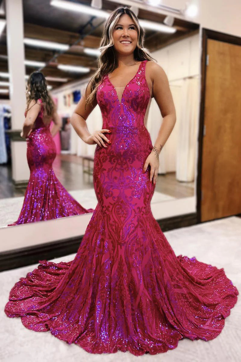 Model wearing a sparkling V-neck sequin lace mermaid prom dress.