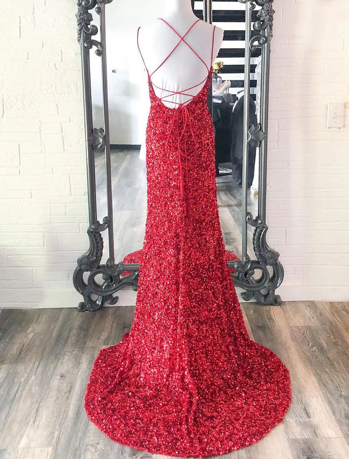 Back view of the sequin mermaid gown, showcasing its floor-length design.