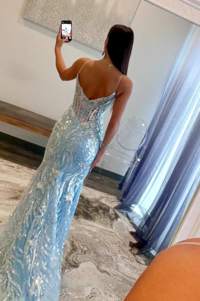 Side view of the sequin mermaid prom dress, highlighting the fitted silhouette.