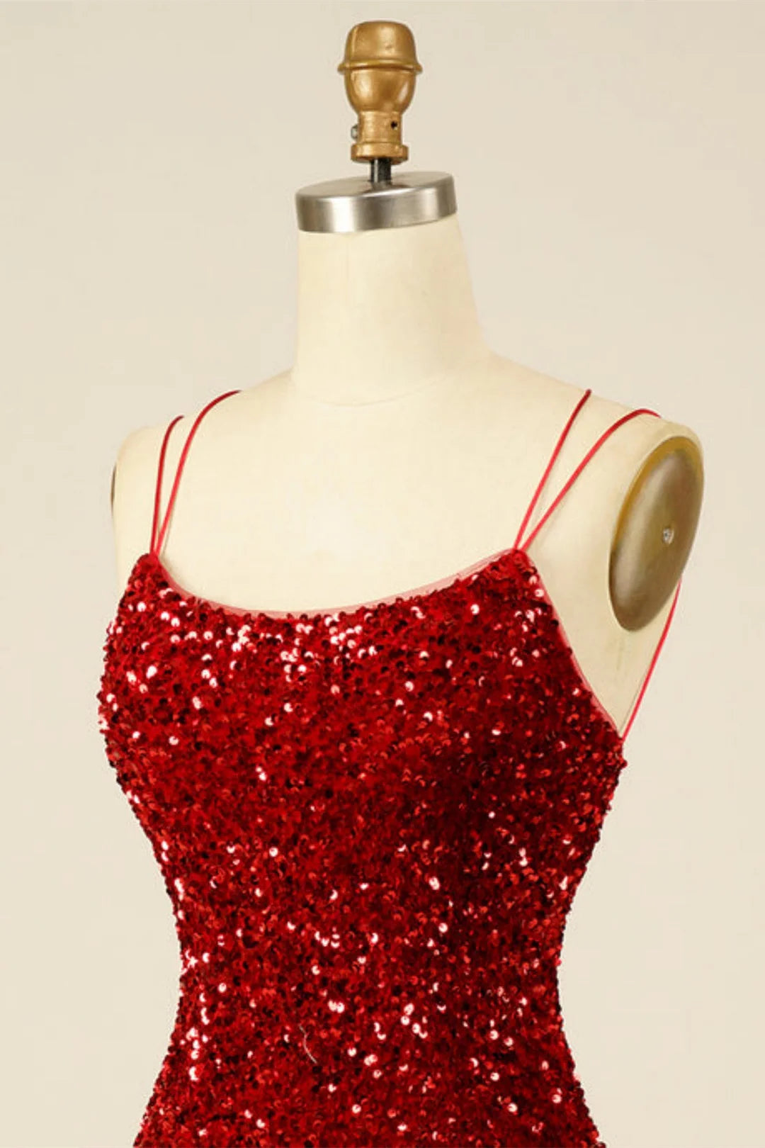 Side view of the sequin V-neck dress, showing the elegant sheath silhouette.