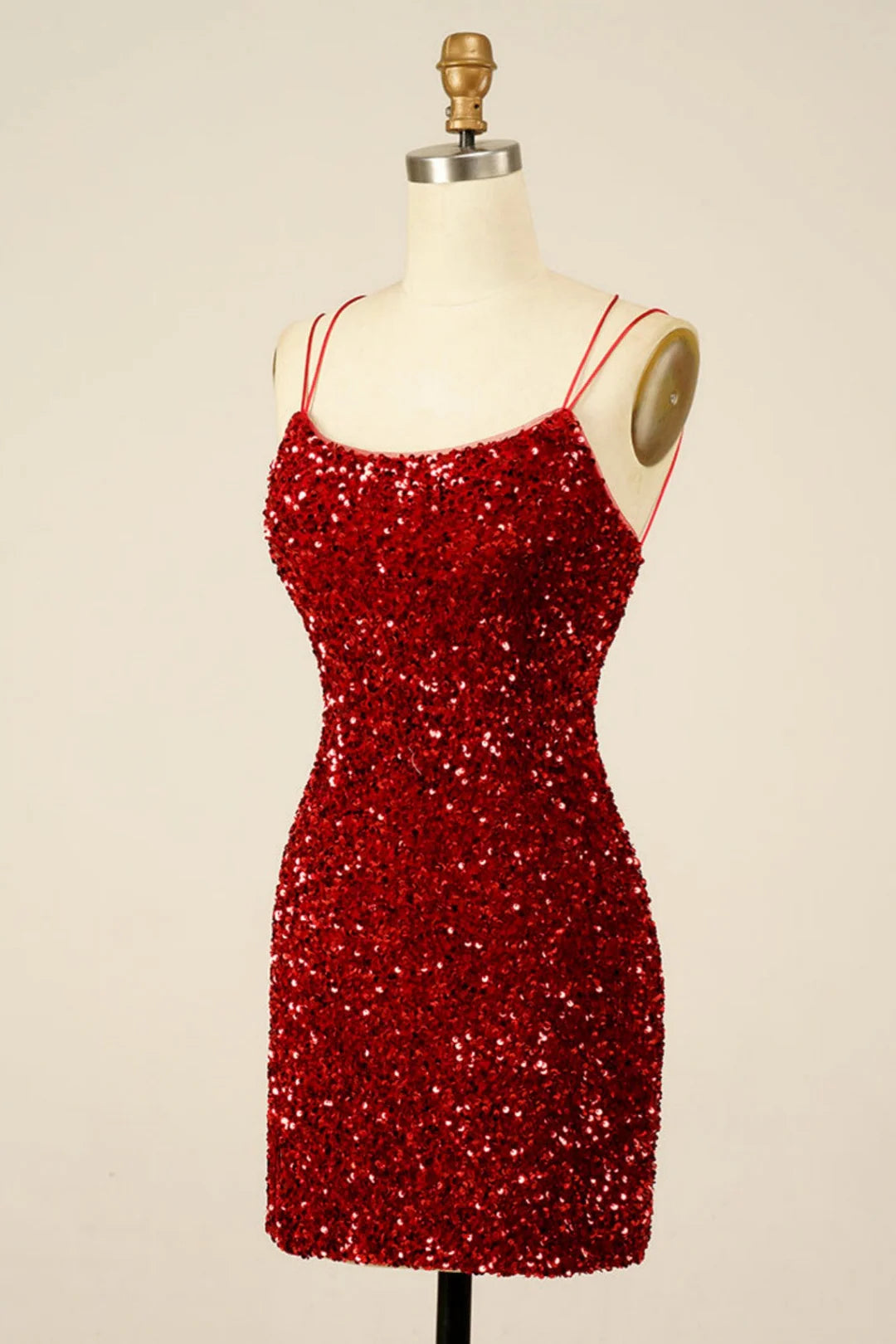 Close-up of the sequin fabric and V-neckline on the homecoming dress.