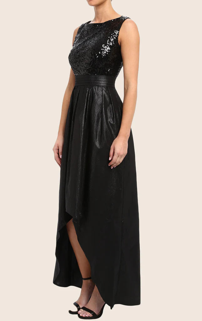 Close-up of the sequin fabric and high-low hem of the formal prom dress.