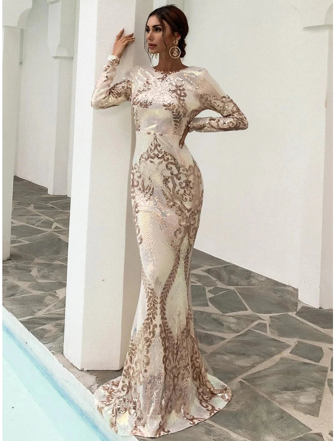 Back view of the mermaid trumpet evening gown showing sweep train.