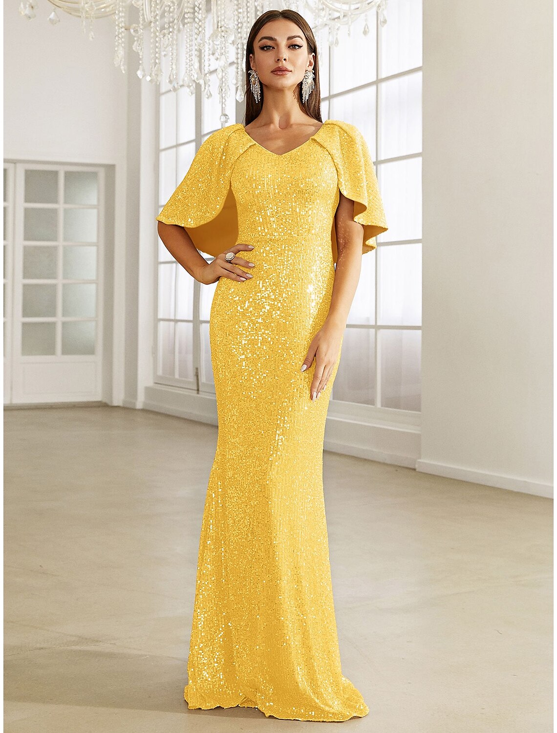 Close-up of the glitter and sequin embellishments on the formal evening dress.