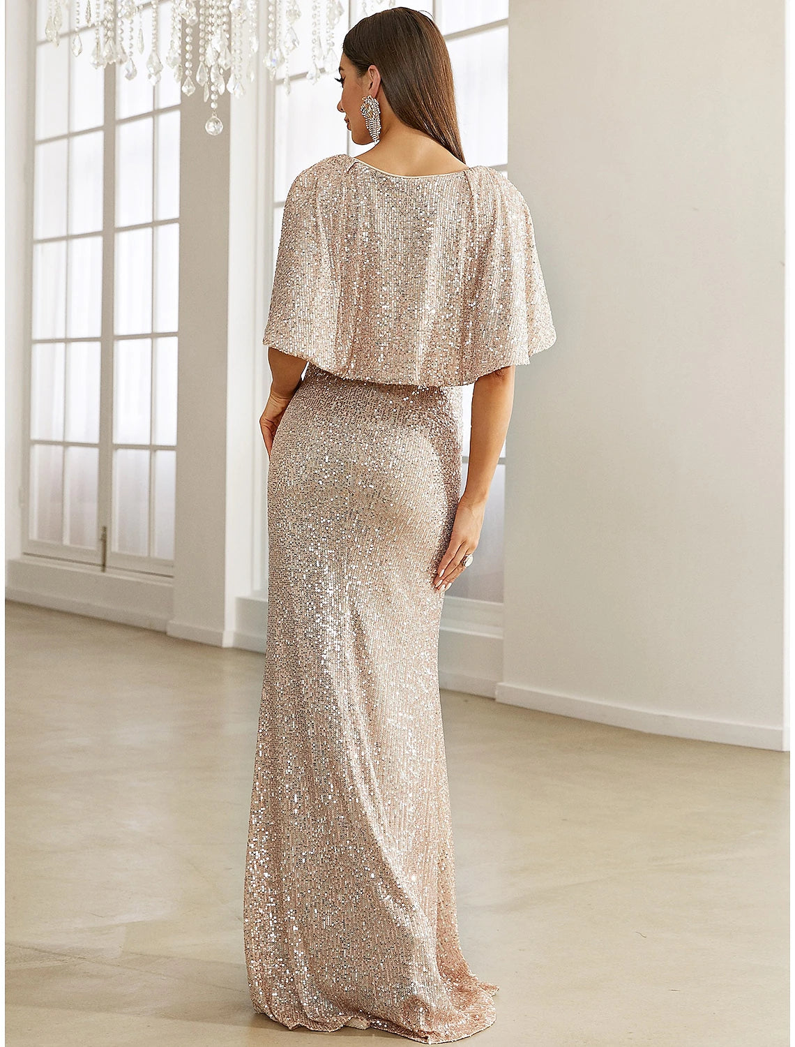 Full length view of the shimmering sequined formal dress, ideal for special occasions.