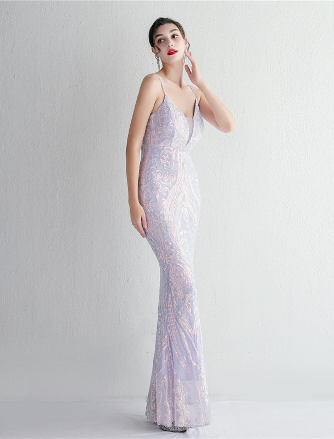 Elegant floor-length sequined dress for formal events.